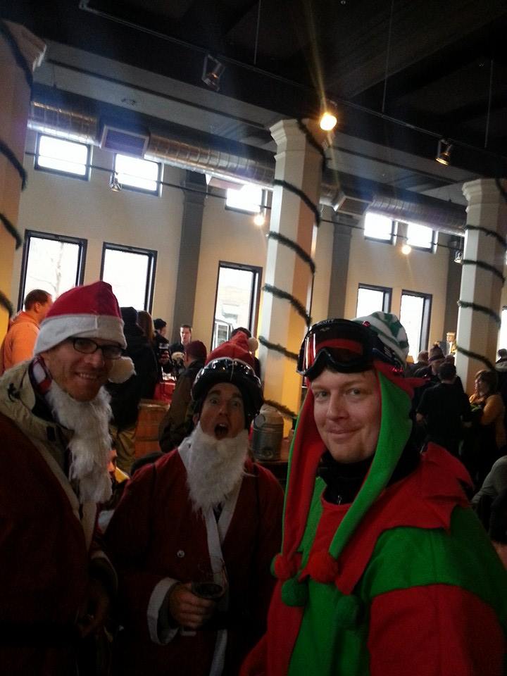 Three early riders in Santa and elf costumes